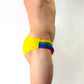 Slim Rainbow Sunga Side Stock Photo